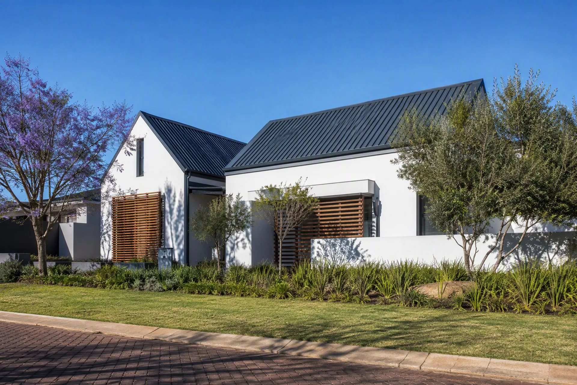 Completed charcoal roof on a modern Pretoria home